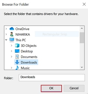 Choose the folder that contains the driver file that you downloaded earlier and click “OK.”